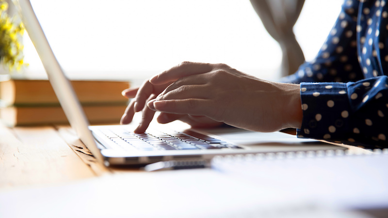 Female hands typing