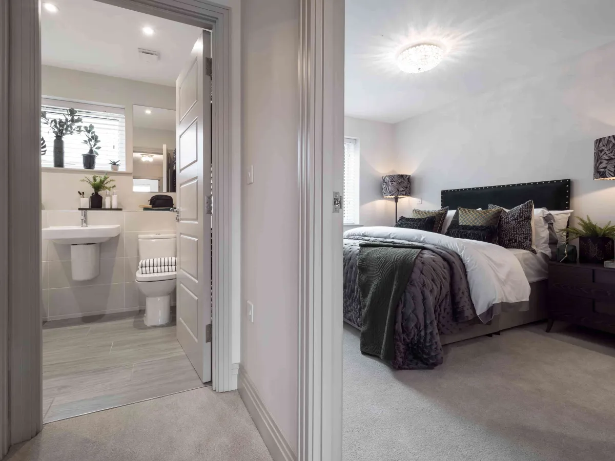 hallway view of bathroom and bedroom